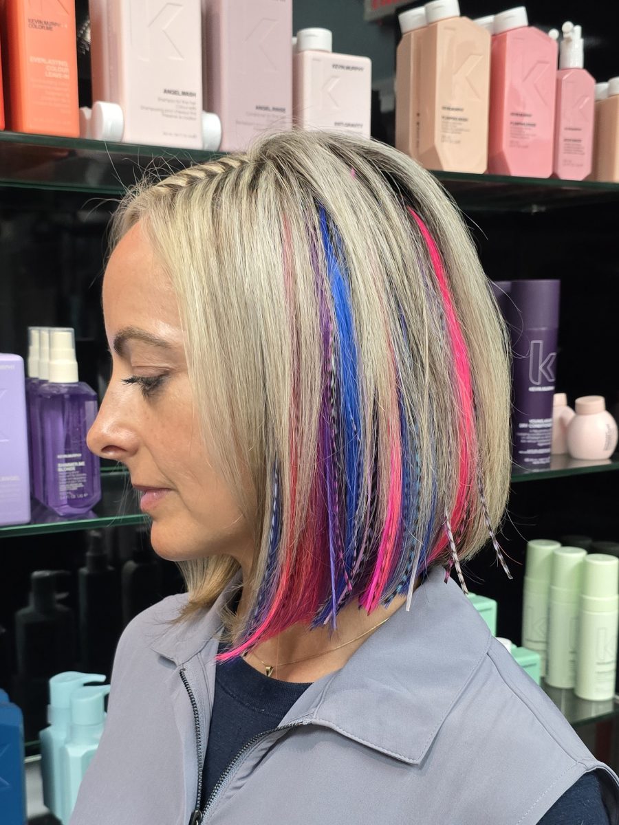 Seamless hair extensions adding length and volume with a fresh cut by Kristan Sayers at K Bella Hair Studio & Spa in Brighton, MI