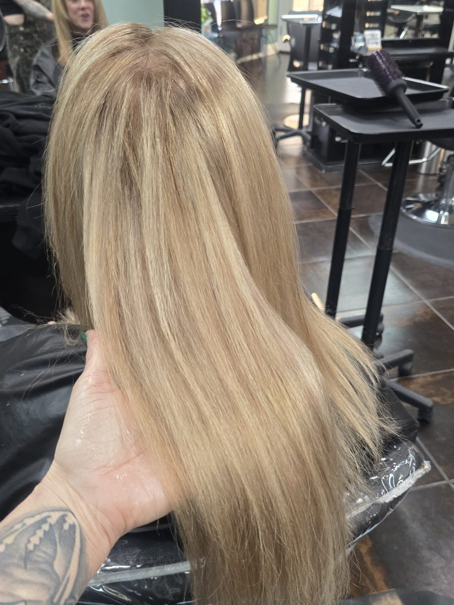 Precision Blonde platimum hilights utilized her natural hair color between and did a soft layered cut with rich custom color by Kristan Sayers at K Bella Hair Studio & Spa in Brighton, MI
