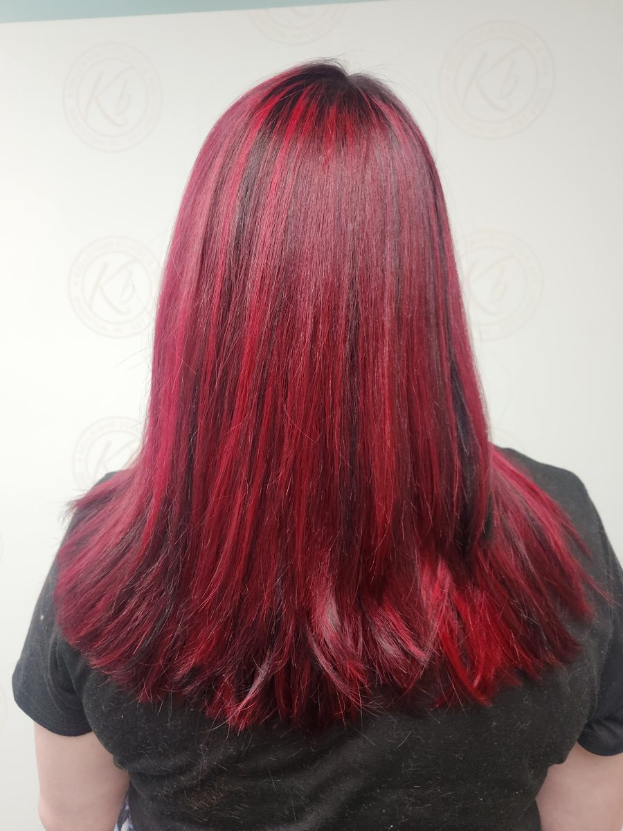 Sun-kissed balayage highlights accented with vivid color by Siobhan Rozinski at K Bella Hair Studio in Brighton, MI - after transformation
