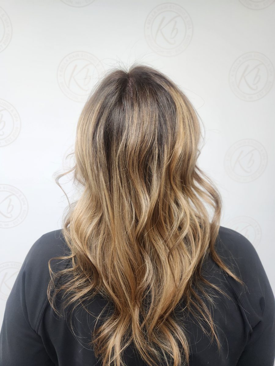 Sun-kissed balayage highlights with a fresh cut by Siobhan Rozinski at K Bella Hair Studio in Brighton, MI