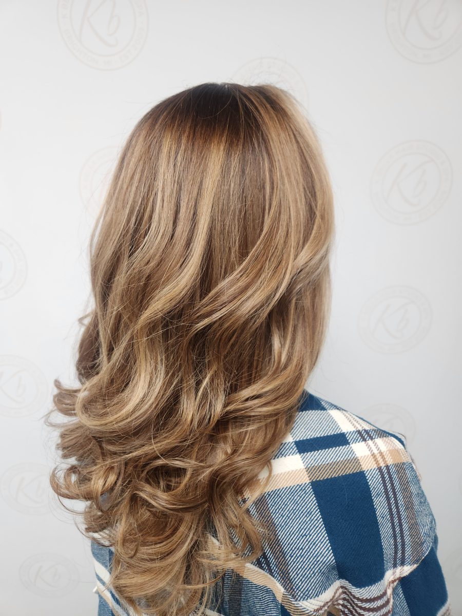 Sun-kissed balayage highlights by Siobhan Rozinski at K Bella Hair Studio & Spa in Brighton, MI