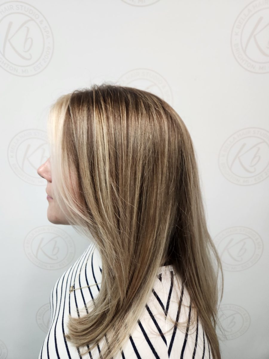 Dimensional highlights and lowlights with hand-painted balayage by Siobhan Rozinski at K Bella Hair Studio & Spa in Brighton, MI - after transformation