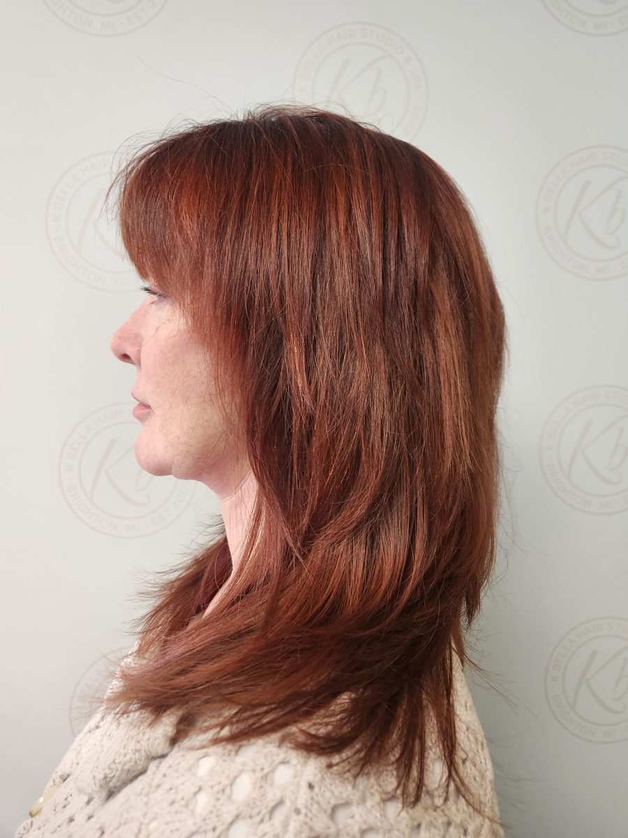 Precision Red refresh w/hilites & layered cut w/fringe with dimensional highlights by Siobhan Rozinski at K Bella Hair Studio & Spa in Brighton, MI