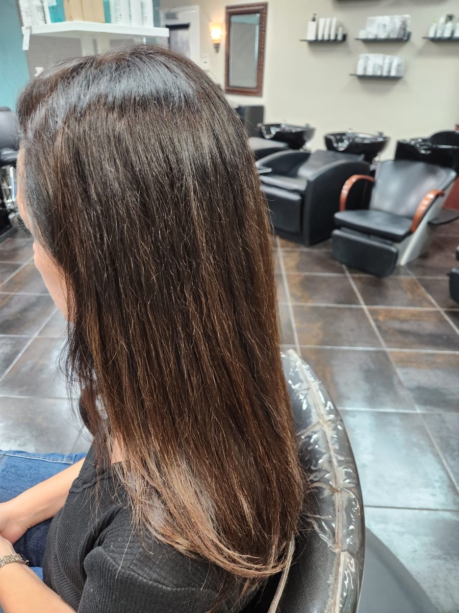 Permanent straightner before treatment by Siobhan Rozinski at K Bella Hair Studio & Spa in Brighton, MI