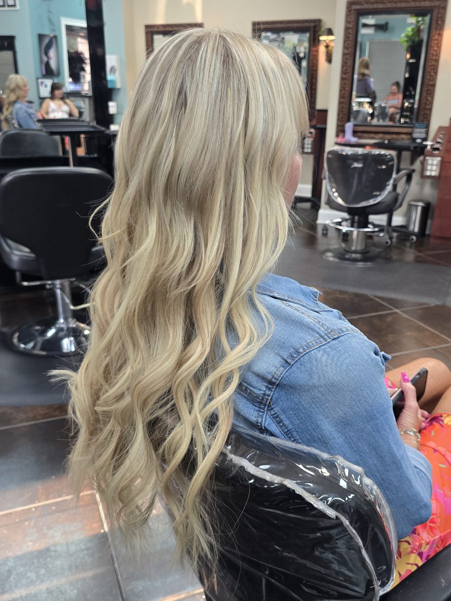 Dimensional highlights and lowlights with seamless extensions by Kristan Sayers at K Bella Hair Studio & Spa in Brighton, MI - after transformation