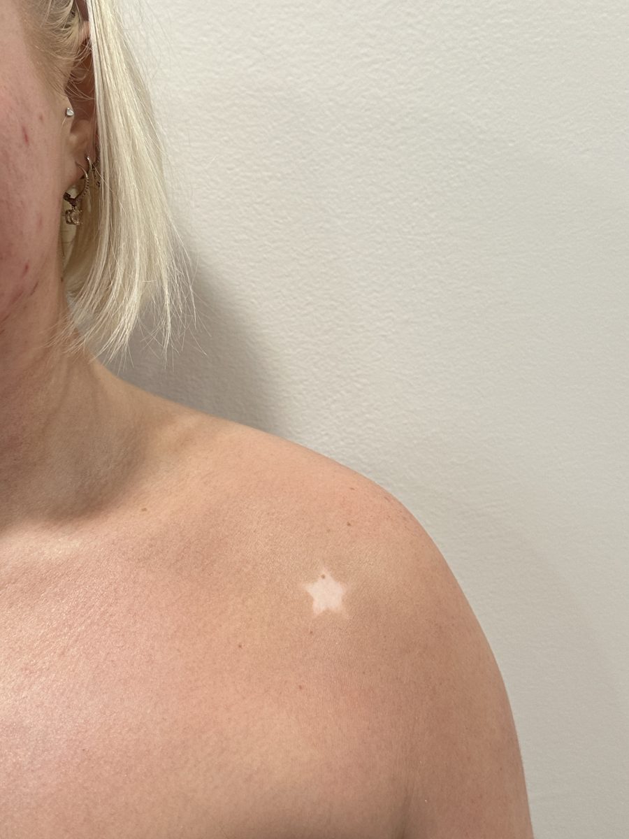Custom airbrush spray tan results by Liberty Greenwood at K Bella Hair Studio & Spa in Brighton, MI - after transformation