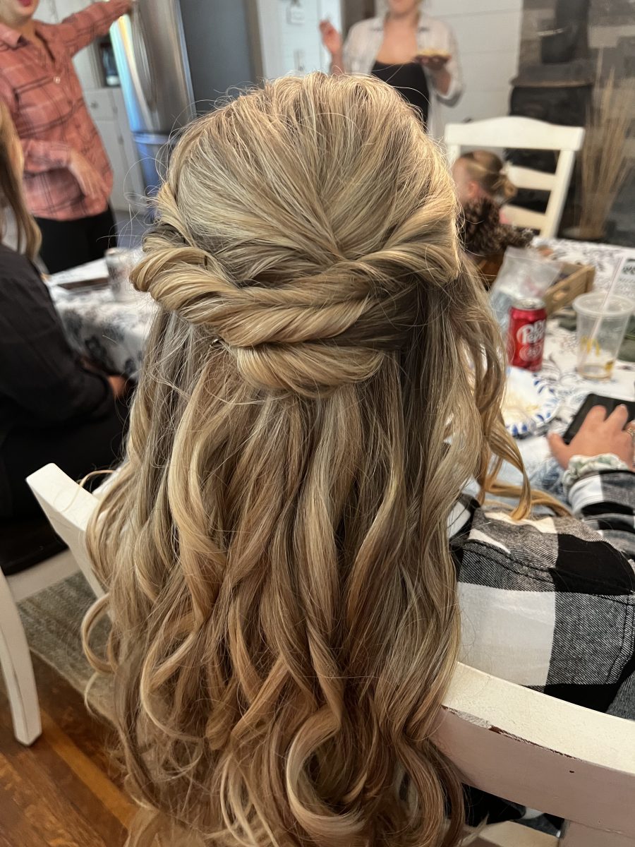 Bridal updo hairstyle for wedding day by Raquel Vettese at K Bella Hair Studio in Brighton, MI