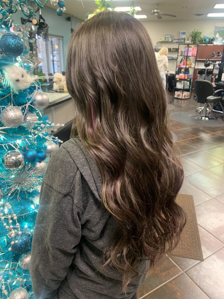 Seamless hair extensions adding length and volume by Brittney Holstege at K Bella Hair Studio in Brighton, MI