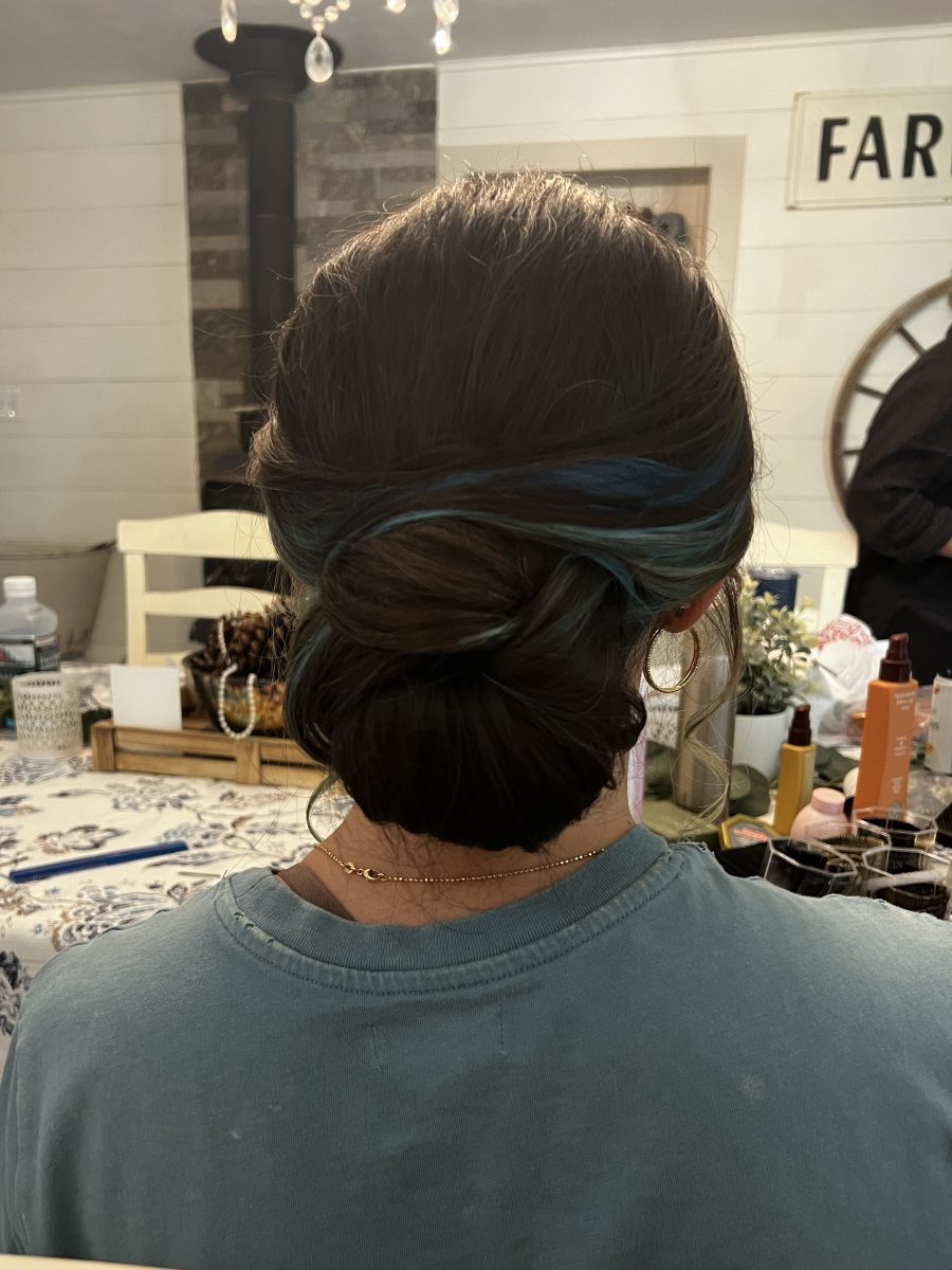 Bridal updo hairstyle for wedding day by Raquel Vettese at K Bella Hair Studio in Brighton, MI
