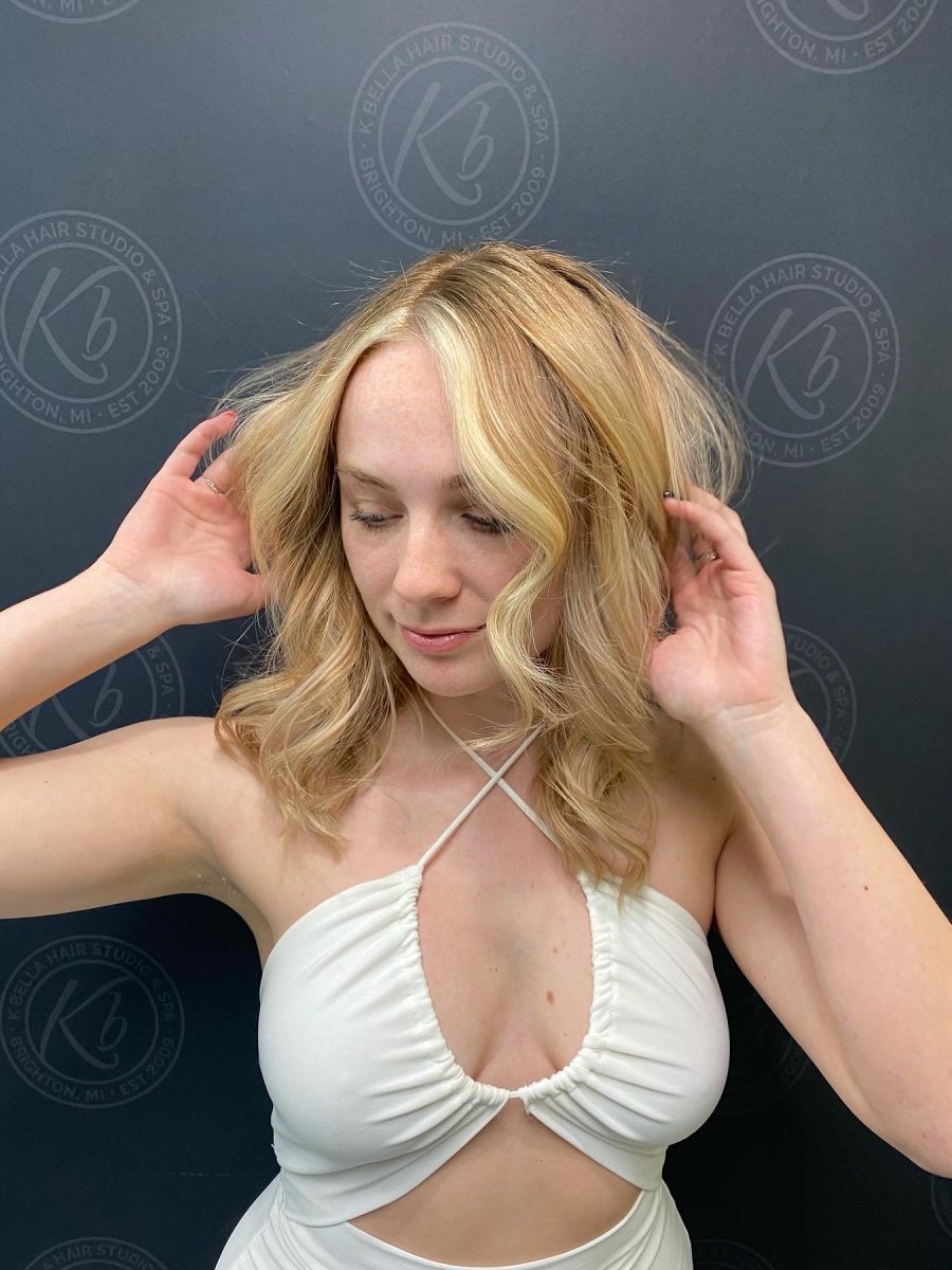Sun-kissed balayage highlights by Abbey French at K Bella Hair Studio in Brighton, MI