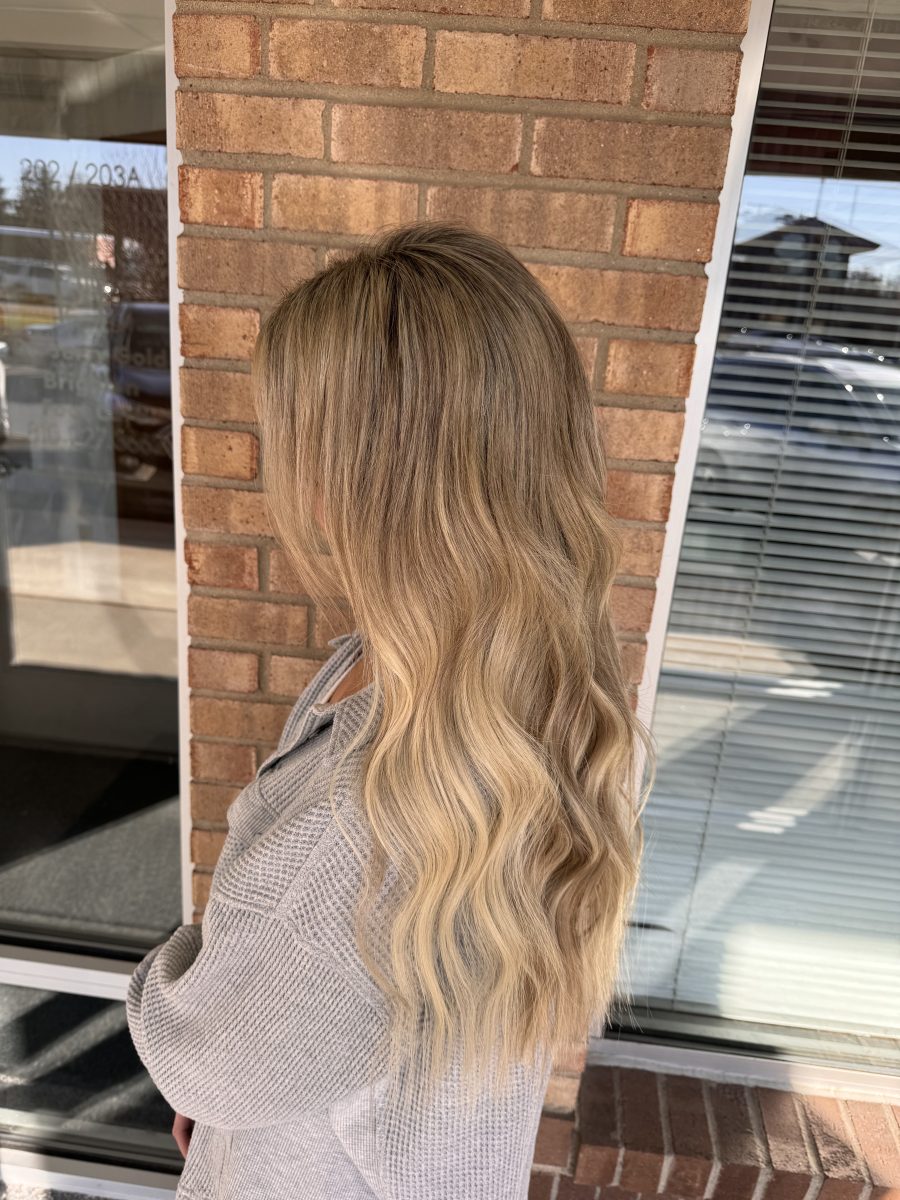Seamless hair extensions adding length and volume by Kristan Sayers at K Bella Hair Studio in Brighton, MI - after transformation
