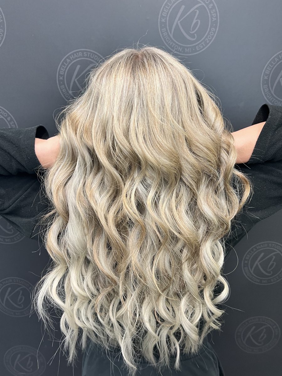 Seamless hair extensions adding length and volume by Raelynn Haan at K Bella Hair Studio in Brighton, MI - after transformation