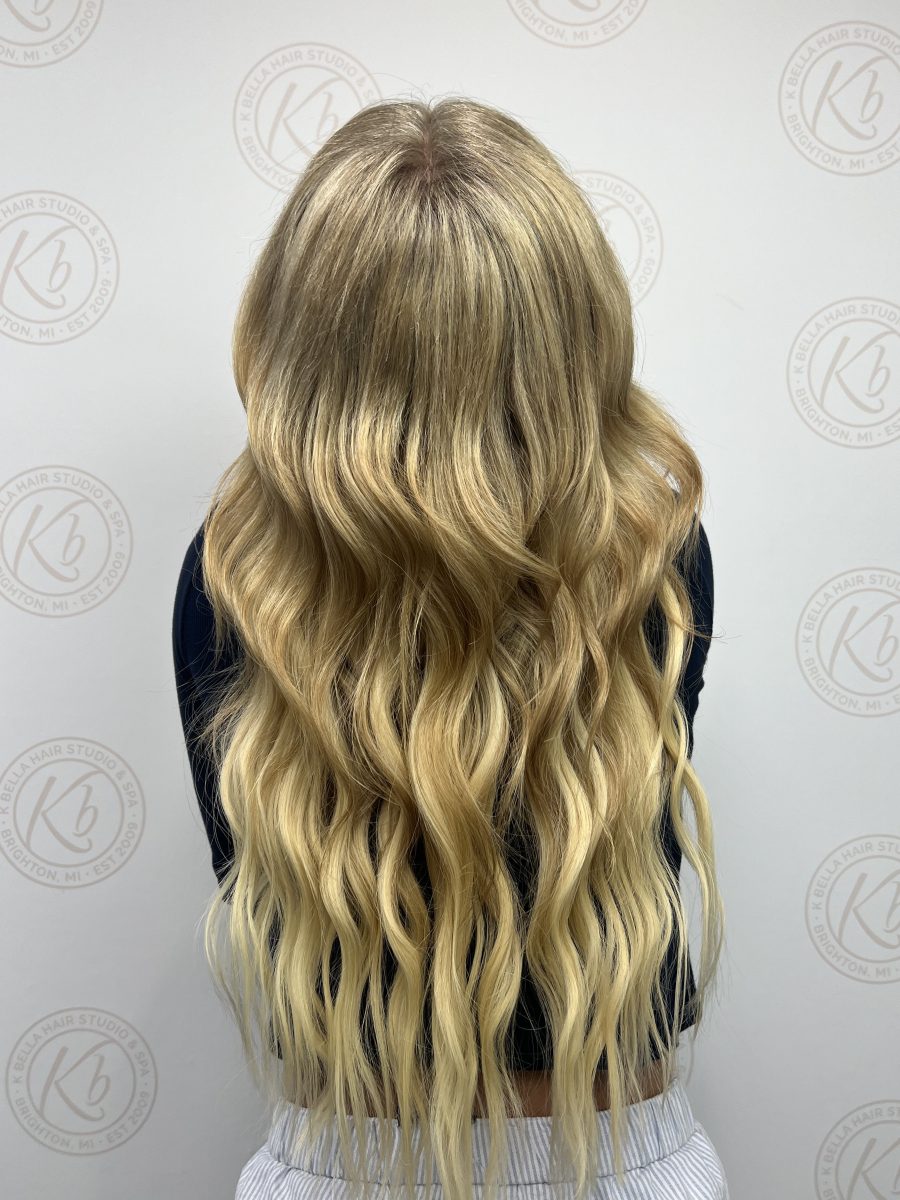 Seamless hair extensions adding length and volume by Raelynn Haan at K Bella Hair Studio in Brighton, MI - after transformation