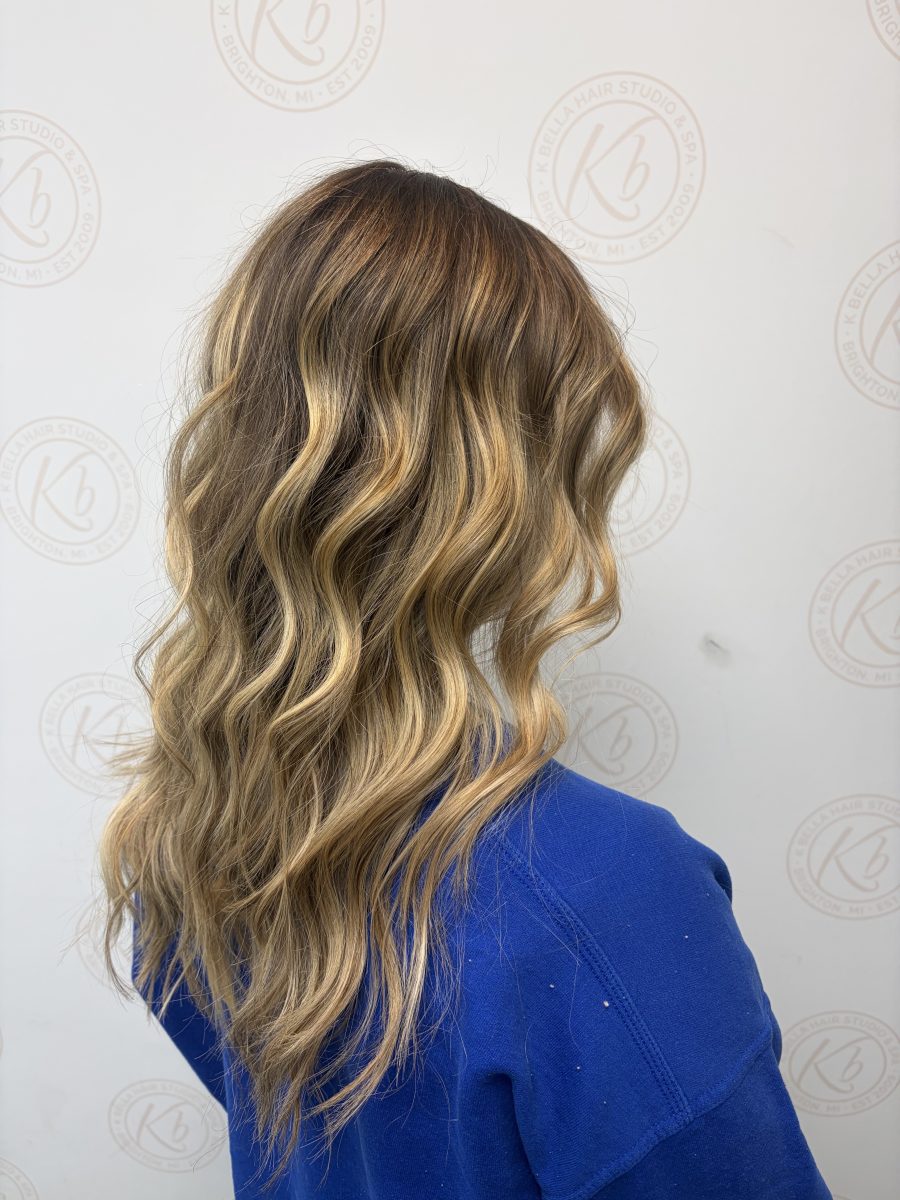 Sun-kissed balayage highlights by Abbey French at K Bella Hair Studio in Brighton, MI