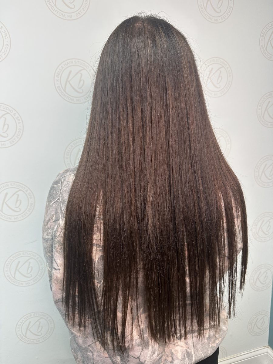 Seamless hair extensions adding length and volume with restorative treatment by Liberty Greenwood at K Bella Hair Studio & Spa in Brighton, MI - after transformation