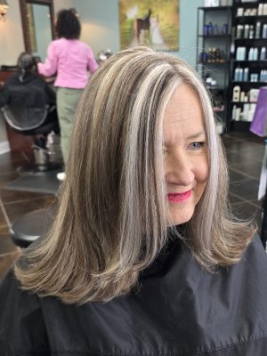Dimensional highlights and lowlights with a fresh cut by Kristan Sayers at K Bella Hair Studio & Spa in Brighton, MI