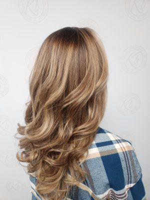 Sun-kissed balayage highlights by Siobhan Rozinski at K Bella Hair Studio & Spa in Brighton, MI