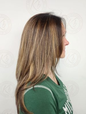 Sun-kissed balayage highlights with fresh root touch-up by Siobhan Rozinski at K Bella Hair Studio & Spa in Brighton, MI