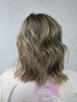 Dimensional highlights and lowlights with a fresh cut by Abbey French at K Bella Hair Studio & Spa in Brighton, MI