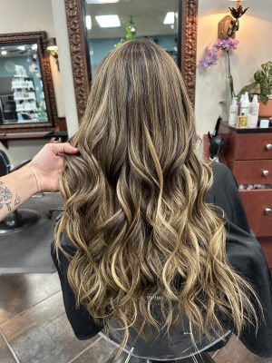 Seamless hair extensions adding length and volume by Kameryn Bell at K Bella Hair Studio & Spa in Brighton, MI - after transformation