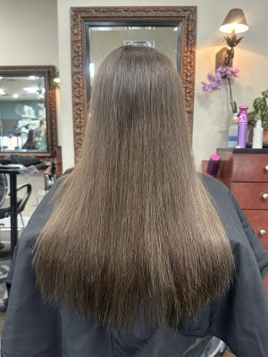 Seamless hair extensions adding length and volume by Kameryn Bell at K Bella Hair Studio & Spa in Brighton, MI - after transformation
