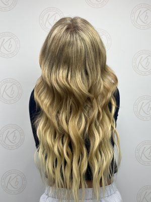 Seamless hair extensions adding length and volume by Raelynn Haan at K Bella Hair Studio in Brighton, MI - after transformation