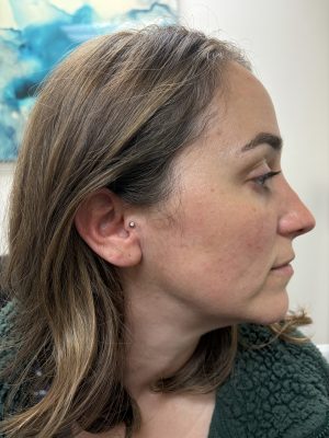 Ear piercing by K Bella by Paige Spence at K Bella Hair Studio & Spa in Brighton, MI